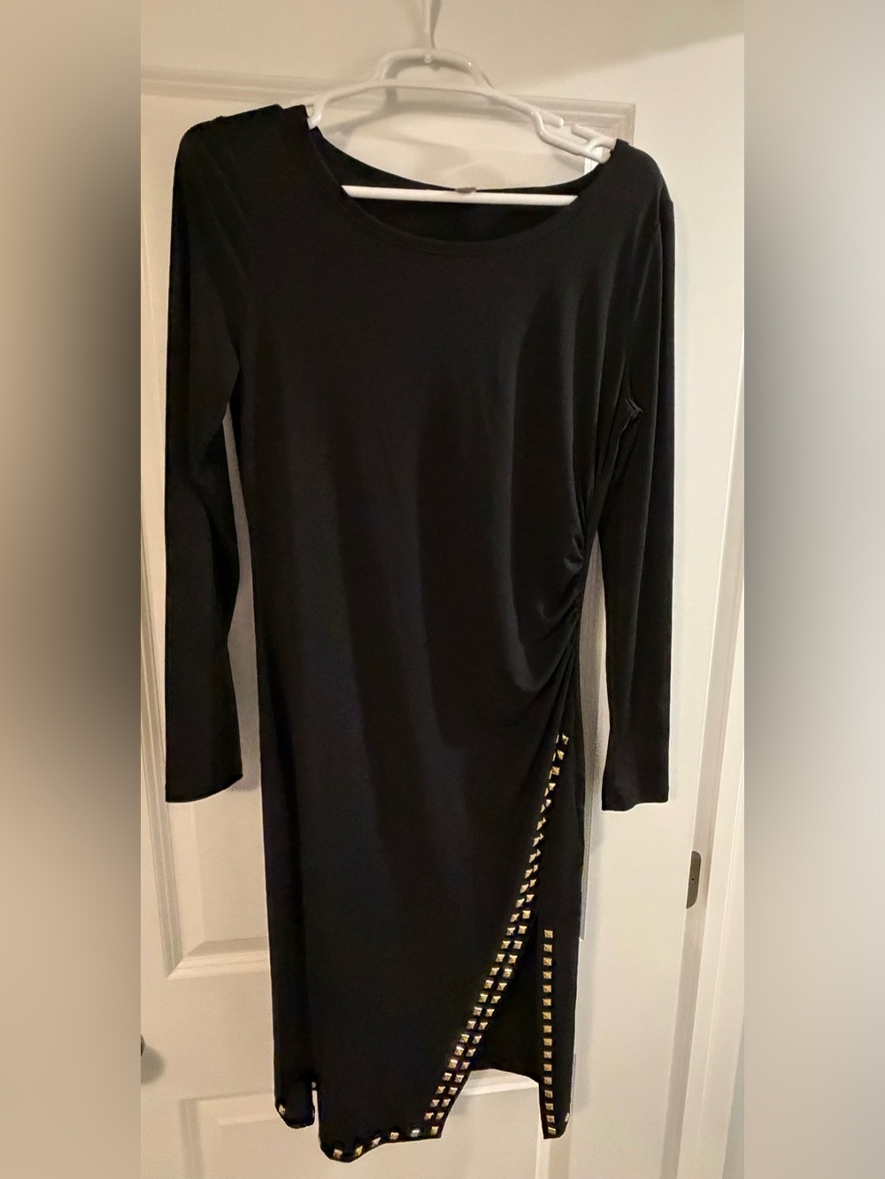 Women’s size M Michael Kors long sleeve black dress with studs.
EUC